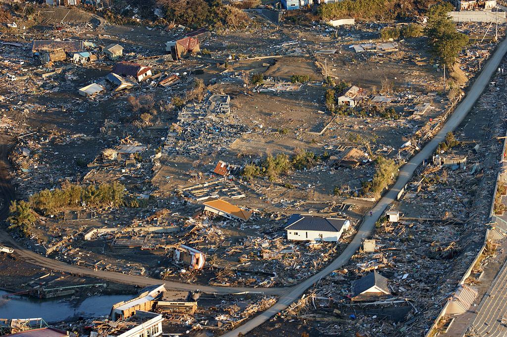 1024px-US_Navy_110318-N-0076O-004_An_aerial_view_of_damage_to_northern_Honshu,_Japan,_after_a_9.0_magnitude_earthquake_and_subsequent_tsunami_devastated_t